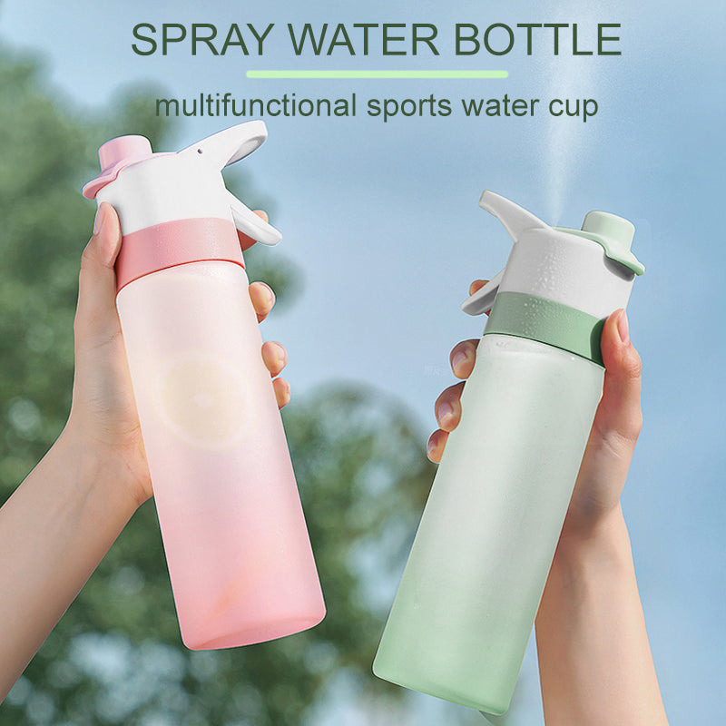 Water bottle with spray feature