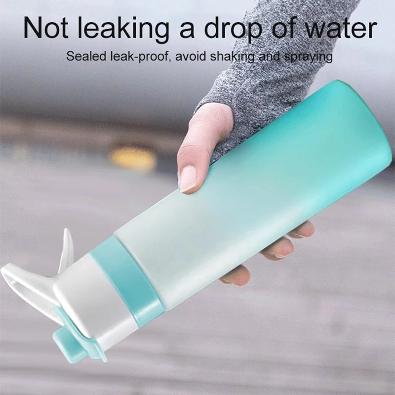 Water bottle with spray feature