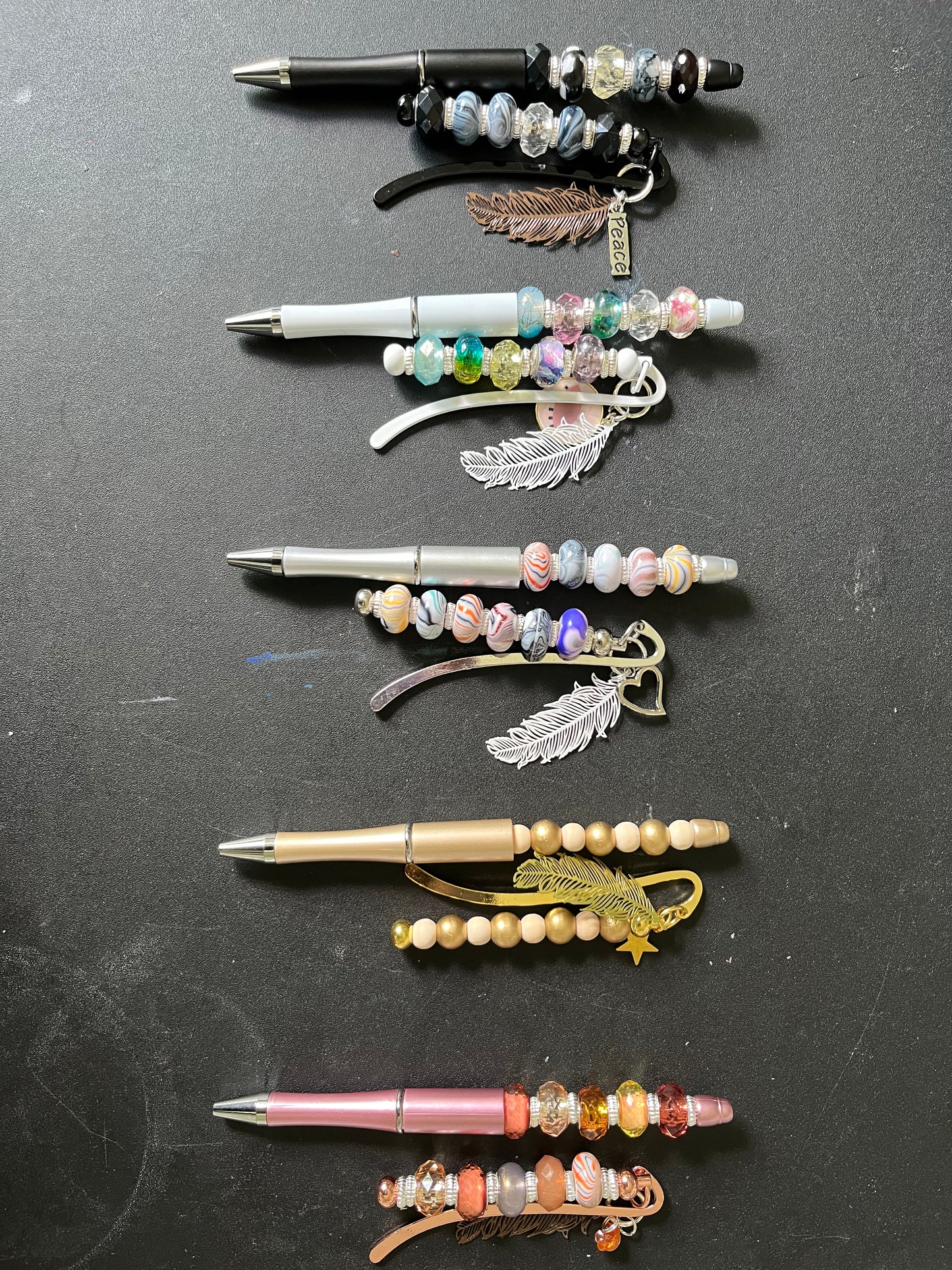 Bookmarks and Pen with Feather