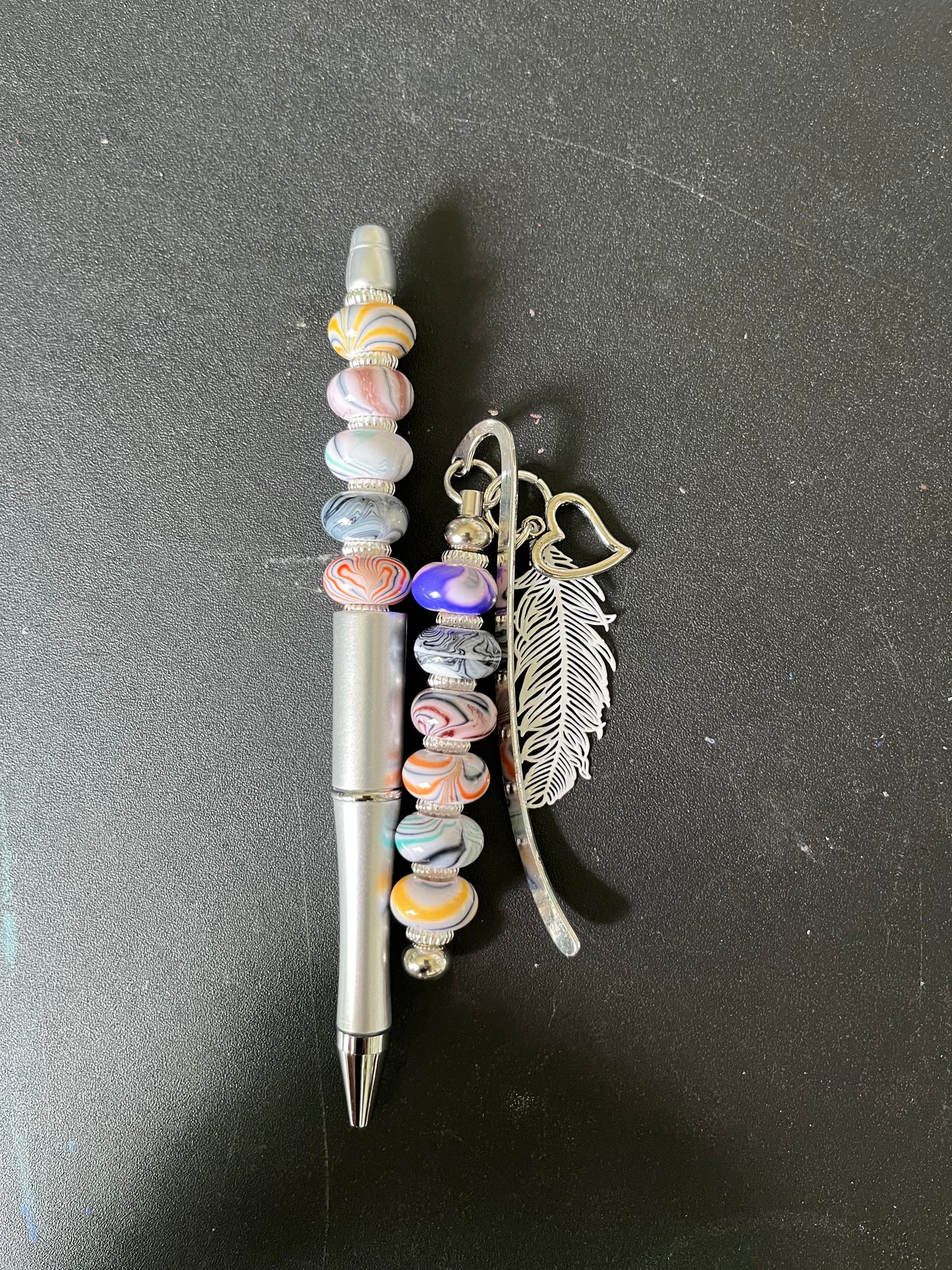 Bookmarks and Pen with Feather