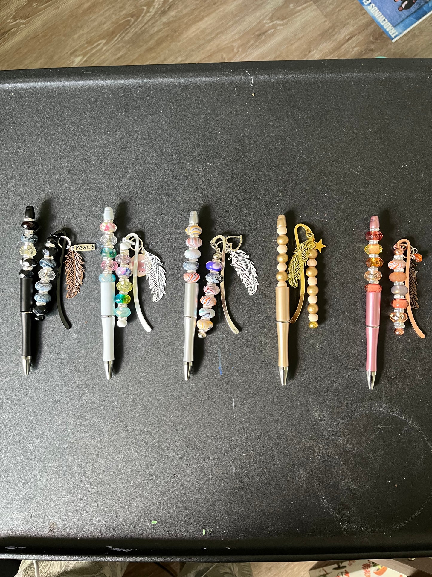 Bookmarks and Pen with Feather